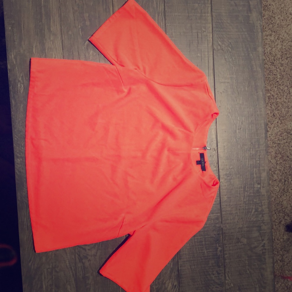 A hot pink crop top.